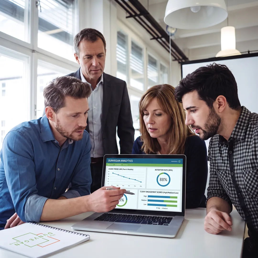 Business consultants reviewing retention insights