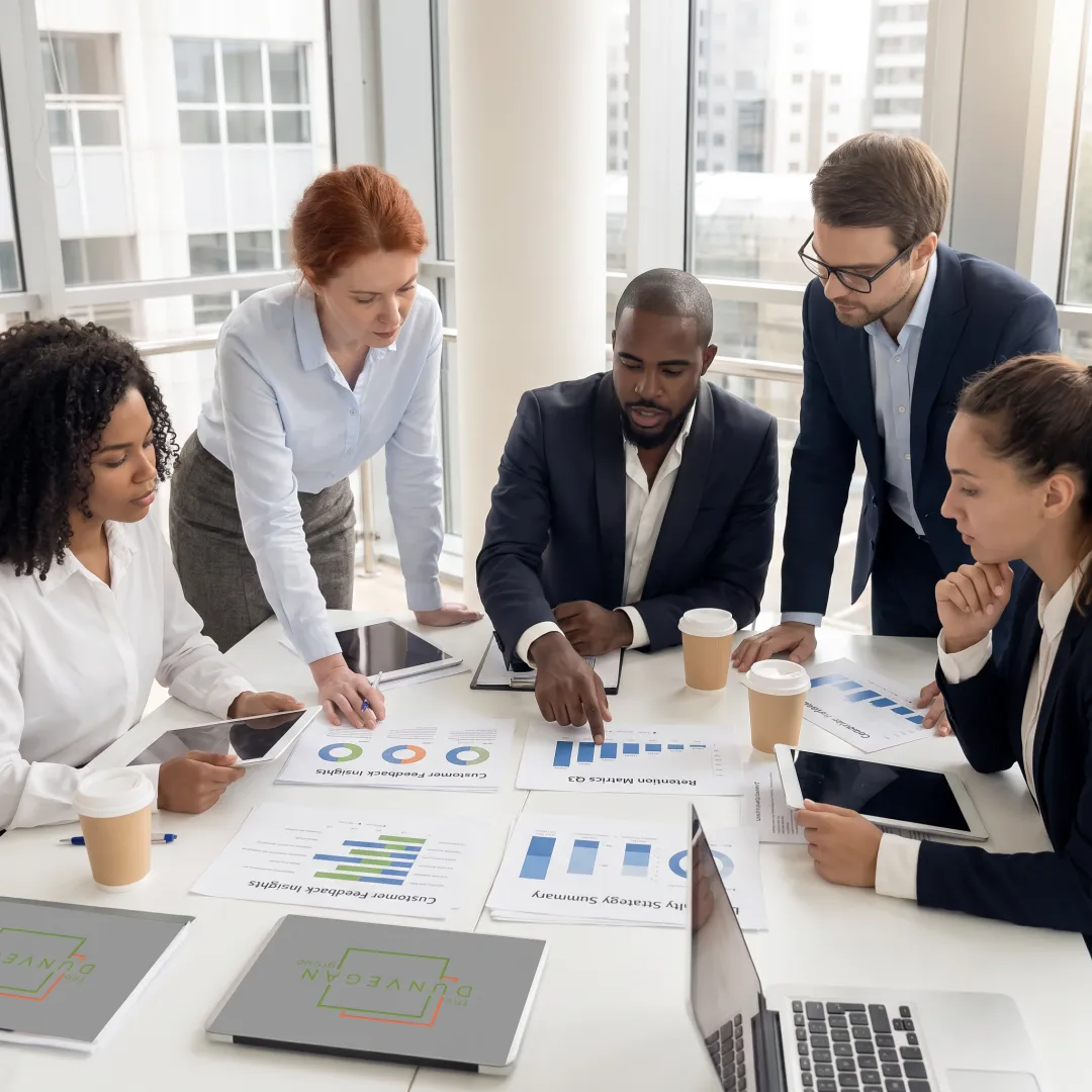 Consultants discussing customer retention strategy