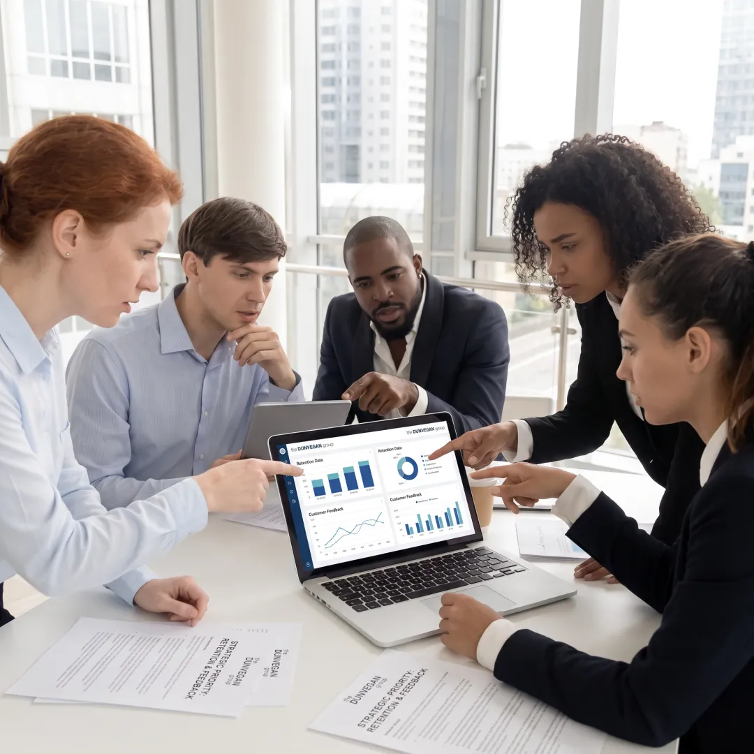 Business leaders reviewing customer and employee insights